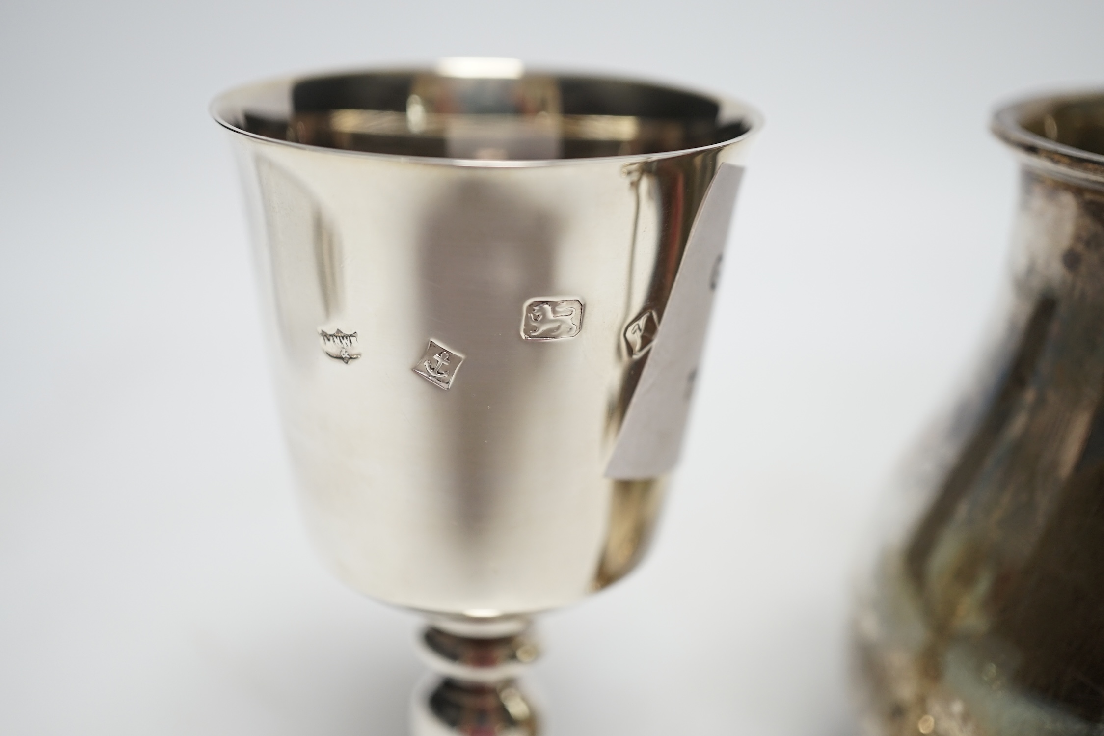 Sundry silver including a modern pig vesta case, two goblets, a match box sleeve and modern cream jug. Fair condition.